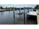 Private dock with boat lift on canal; ideal for boating enthusiasts looking for waterfront living at 187 Beeney Se Rd, Port Charlotte, FL 33952