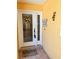 Welcoming front door with decorative details and colorful accents, adding charm to the entry at 187 Beeney Se Rd, Port Charlotte, FL 33952