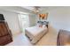 Bright bedroom with ceiling fan and tiled floor at 18954 Ayrshire Cir, Port Charlotte, FL 33948