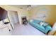 Guest room features sofa, desk and TV at 18954 Ayrshire Cir, Port Charlotte, FL 33948