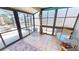 Enclosed lanai with sliding glass doors at 18954 Ayrshire Cir, Port Charlotte, FL 33948