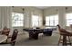 Community billiard room boasting a full-size pool table, seating, and natural light streaming in from large windows at 2020 Willow Hammock Cir # 302, Punta Gorda, FL 33983