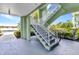 Exterior stairway up to the residences, and near the assigned parking, makes coming and going a breeze at 2020 Willow Hammock Cir # 302, Punta Gorda, FL 33983