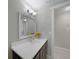 Bathroom featuring a vanity with decorative mirror and a view into another room at 20215 Macon Ln, Port Charlotte, FL 33952