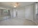 Spacious bedroom with fan, closet, and tile floors at 20215 Macon Ln, Port Charlotte, FL 33952