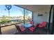 Inviting lanai with seating and views of pond at 2275 S Mccall Rd # 103, Englewood, FL 34224