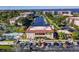 High-angle view of condo community, showcasing boat docks, swimming pool, and parking area at 25188 Marion Ave # 10, Punta Gorda, FL 33950