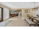 Open floor plan featuring a living room, dining area, and lots of natural light at 25188 Marion Ave # 10, Punta Gorda, FL 33950