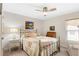 Cozy bedroom with soft lighting, a charming bed, and quaint decor at 27147 Guapore Dr, Punta Gorda, FL 33983