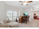 Cozy room featuring a bar with seating, natural light, and comfortable seating area at 27147 Guapore Dr, Punta Gorda, FL 33983