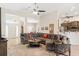 Spacious living room area, showcasing tile floors, neutral paint, and comfortable furniture at 27147 Guapore Dr, Punta Gorda, FL 33983