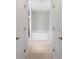Neutral main bathroom showcasing a soaking tub, tile floors and walk in shower at 27147 Guapore Dr, Punta Gorda, FL 33983
