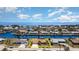Stunning aerial view of a waterfront community with a beautiful coastline and blue skies at 283 Fields Se Ter, Port Charlotte, FL 33952