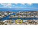 Waterfront home featuring a pool and beautiful views of the surrounding canals at 283 Fields Se Ter, Port Charlotte, FL 33952