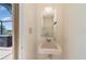 Classic powder room featuring a simple vanity and vintage style at 283 Fields Se Ter, Port Charlotte, FL 33952
