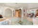 Open-concept living area with hardwood floors, neutral tones, and ample natural light at 283 Fields Se Ter, Port Charlotte, FL 33952