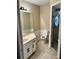 Bathroom featuring a glass shower, tiled floors, and a modern vanity at 376 Waterside St, Port Charlotte, FL 33954