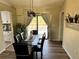 Dining area with dark table and view of pool, creating a stylish space at 376 Waterside St, Port Charlotte, FL 33954