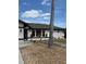 Charming single-story home with neutral paint, complemented by an easy to maintain, xeriscaped yard at 376 Waterside St, Port Charlotte, FL 33954