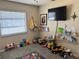 Bright playroom with natural light, toy storage, and playful decor at 376 Waterside St, Port Charlotte, FL 33954