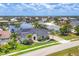 Stunning aerial view showcasing a waterfront property, mature landscaping, and a serene neighborhood setting at 3866 Turtle Dove Blvd, Punta Gorda, FL 33950