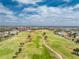 An aerial view of a lush green golf course at 4015 La Costa Island Ct, Punta Gorda, FL 33950