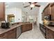 Bright kitchen with granite countertops, stainless steel appliances, and a breakfast bar with seating at 4015 La Costa Island Ct, Punta Gorda, FL 33950