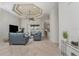Living room with comfortable seating and view of the lanai at 4015 La Costa Island Ct, Punta Gorda, FL 33950