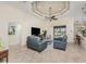 Living room with comfortable seating and view of the lanai at 4015 La Costa Island Ct, Punta Gorda, FL 33950