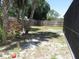 Private backyard with tropical foliage and partial fence at 4309 Badali Rd, North Port, FL 34286