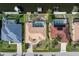 A high definition aerial view that shows the entire property line and landscaping features at 5720 Almar Dr, Punta Gorda, FL 33950