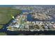 Aerial view of a waterfront neighborhood, showcasing canal access and lush landscaping at 5720 Almar Dr, Punta Gorda, FL 33950