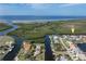 Stunning aerial view of a waterfront property with boat docks and canal access at 5720 Almar Dr, Punta Gorda, FL 33950