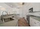 Kitchen area featuring granite counters, stainless appliances, and ample cabinet space at 5720 Almar Dr, Punta Gorda, FL 33950