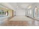 Bright living room with tile floors, high ceilings, and windows offering lots of natural light at 5720 Almar Dr, Punta Gorda, FL 33950