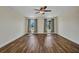 A large bedroom with wood floors and natural light at 6405 Alan Blvd, Punta Gorda, FL 33982