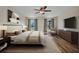 Bedroom with a comfortable bed, neutral decor, and natural light at 6405 Alan Blvd, Punta Gorda, FL 33982