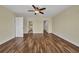 Spacious bedroom with wood floors and a ceiling fan at 6405 Alan Blvd, Punta Gorda, FL 33982