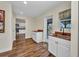 Bright area with white cabinets, wood counters and a view into the spacious kitchen at 6405 Alan Blvd, Punta Gorda, FL 33982