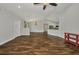 Open-concept living space with hardwood floors, white walls, and lots of light at 6405 Alan Blvd, Punta Gorda, FL 33982