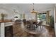 Open concept living space features modern decor, lots of space and hardwood floors at 6405 Alan Blvd, Punta Gorda, FL 33982