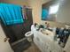 Bathroom featuring a vanity with storage and a shower and tub combo at 8782 La Boca Ave, North Port, FL 34287
