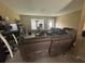 Comfortable living room with neutral walls and tile floor creating a cozy space at 8782 La Boca Ave, North Port, FL 34287