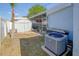 Backyard featuring a large A/C unit with the shed and screened in enclosure at 8795 56Th N St, Pinellas Park, FL 33782