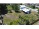 An aerial perspective of the property's backyard, offering a glimpse of outdoor space at 899 S Broadway, Englewood, FL 34223