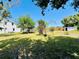 The expansive backyard provides ample space for outdoor activities and potential landscaping at 899 S Broadway, Englewood, FL 34223