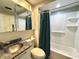 Full bathroom with shower, tub, vanity and medicine cabinet at 899 S Broadway, Englewood, FL 34223