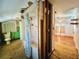 Bathroom and bedroom with exposed framing; needs remodeling at 899 S Broadway, Englewood, FL 34223
