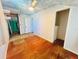 Bedroom featuring hardwood floors with an adjacent closet at 899 S Broadway, Englewood, FL 34223
