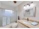 Bathroom featuring granite counters, vanity and glass-enclosed shower at 949 Springview Nw Ave, Port Charlotte, FL 33948